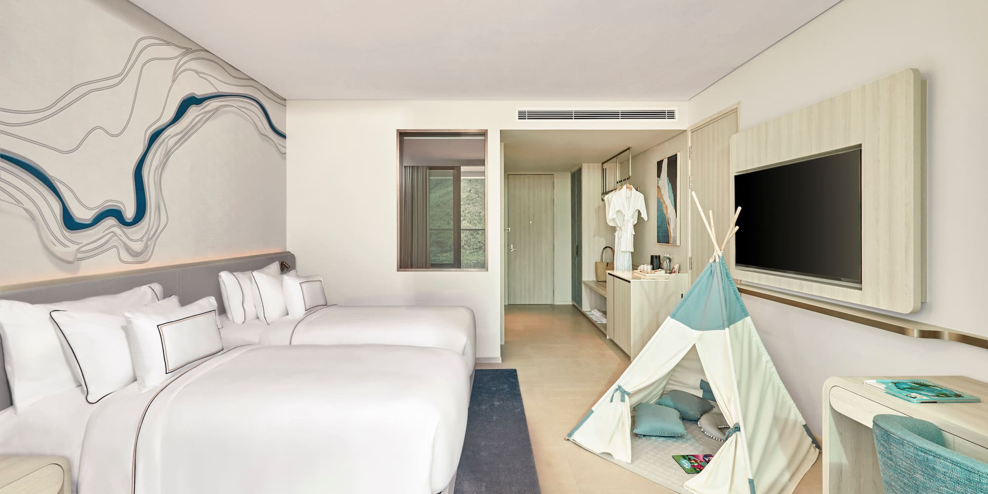 Modern hotel room with two beds, unique wavy wall art, and a children's teepee.