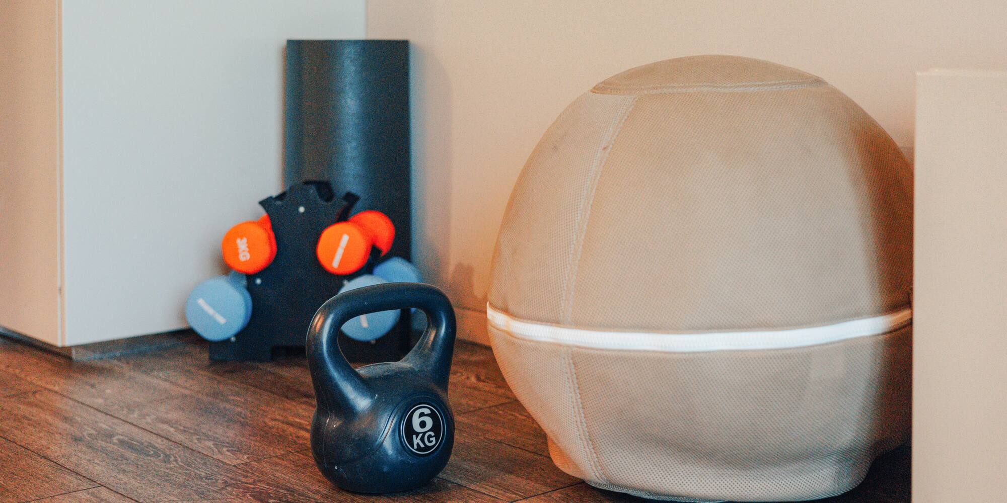 6kg kettlebell, dumbbells, stability ball, and foam roller for home workout.