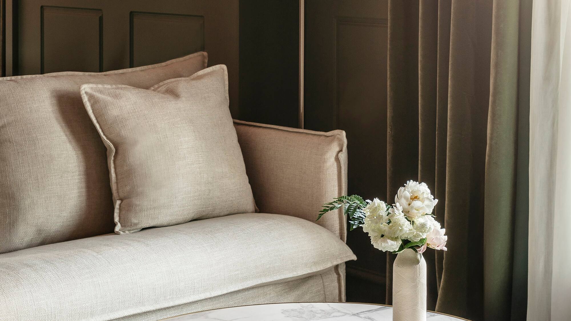 a vase of flowers on a table