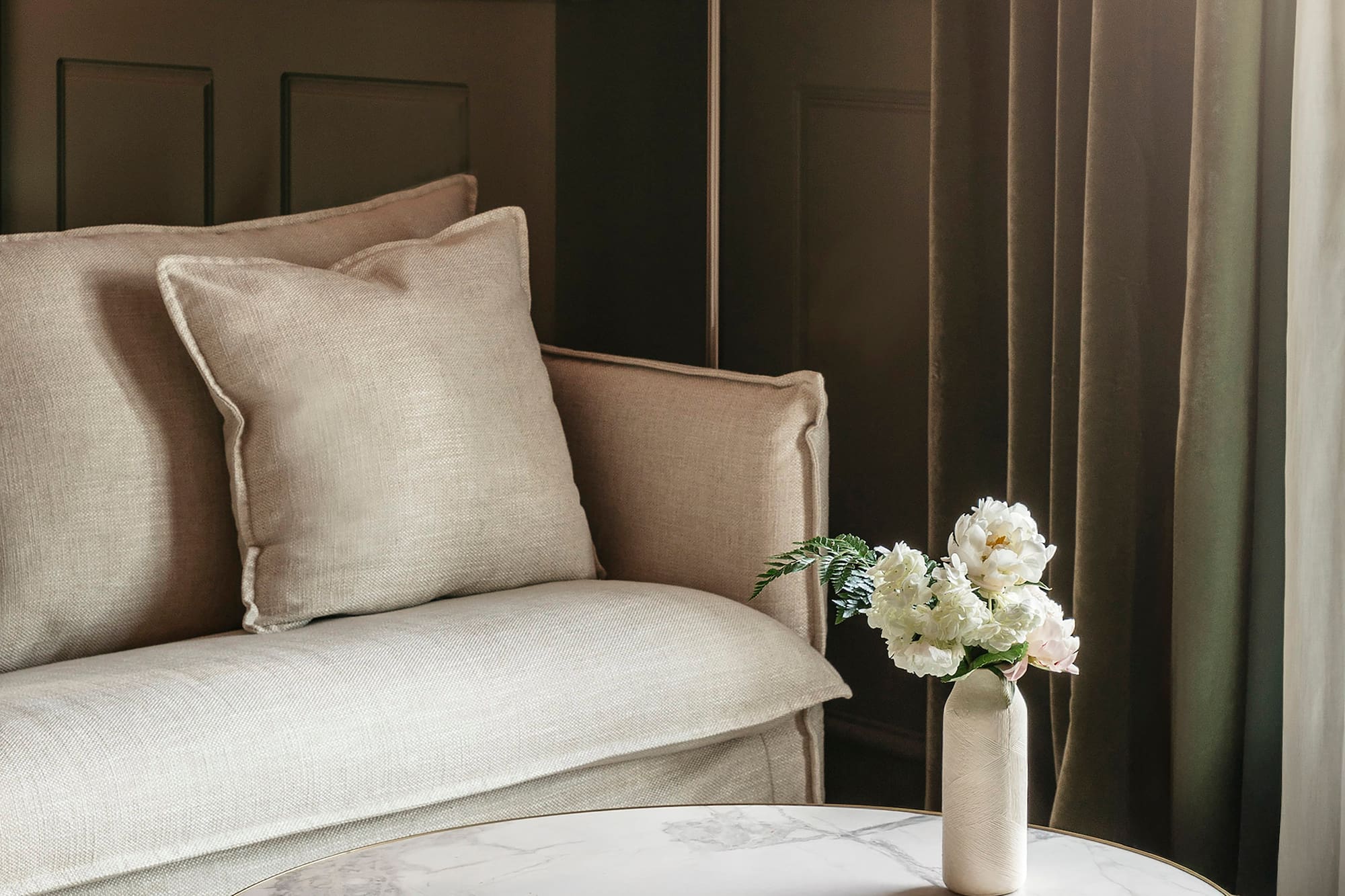 a vase of flowers on a table