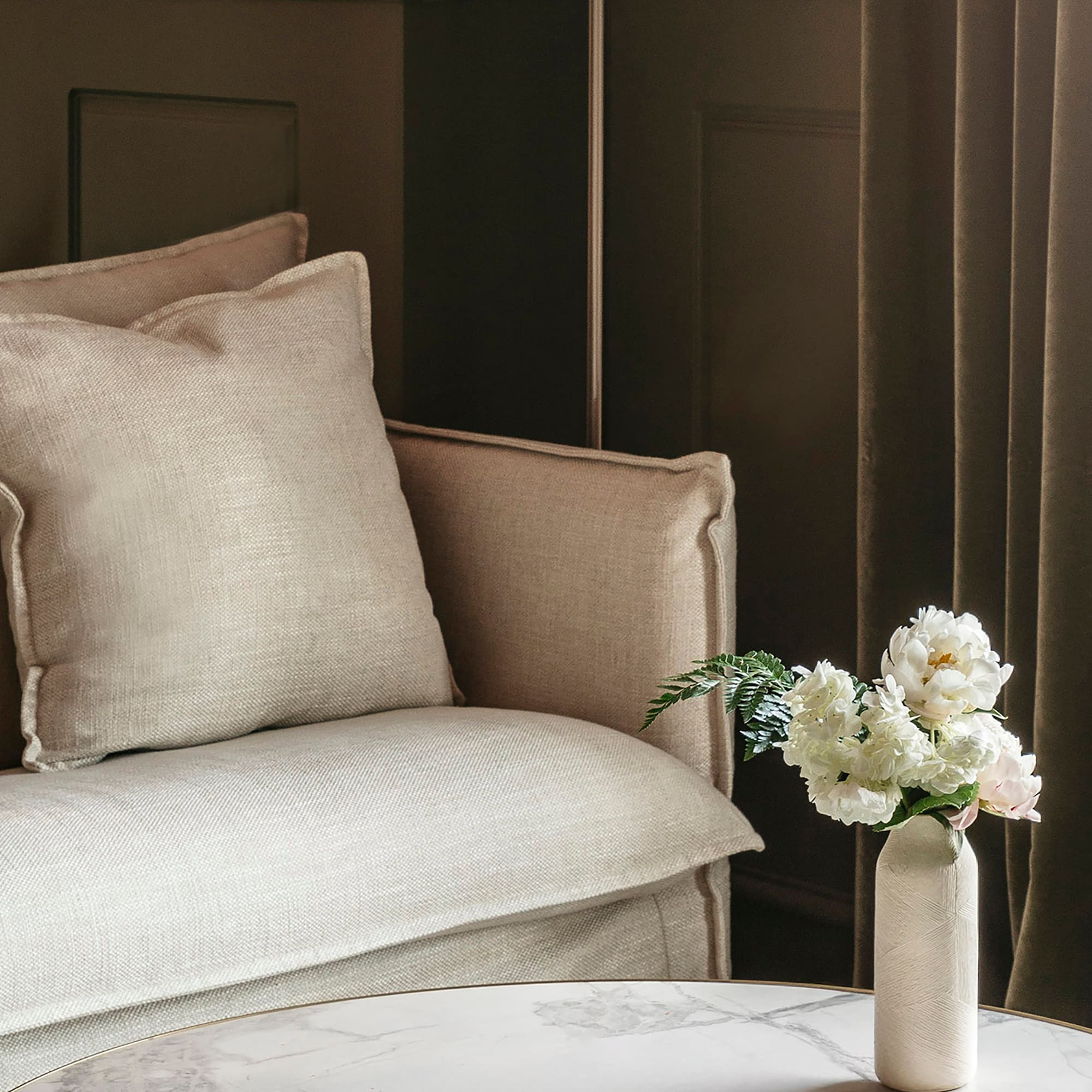 a vase of flowers on a table