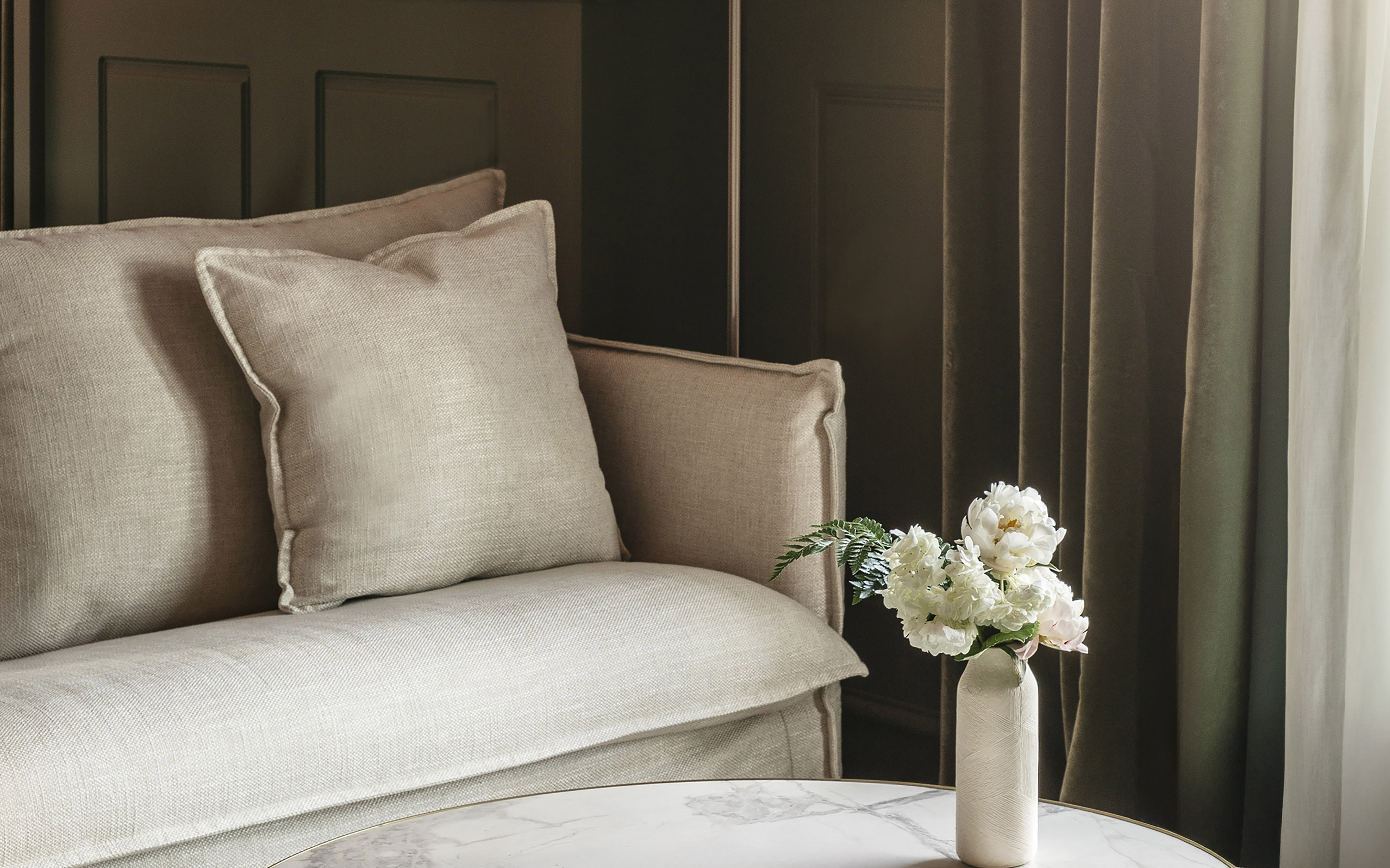 a vase of flowers on a table