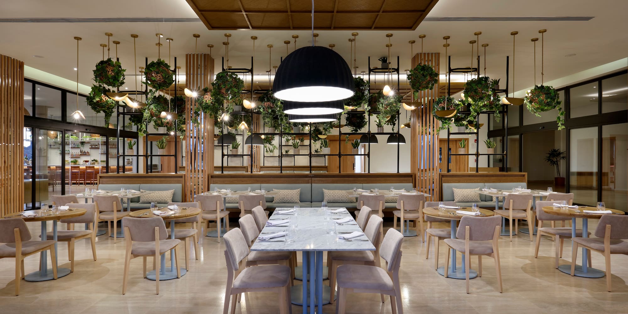 a restaurant with tables and chairs