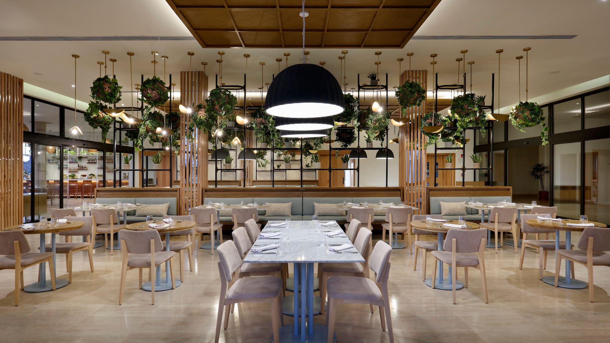 a restaurant with tables and chairs