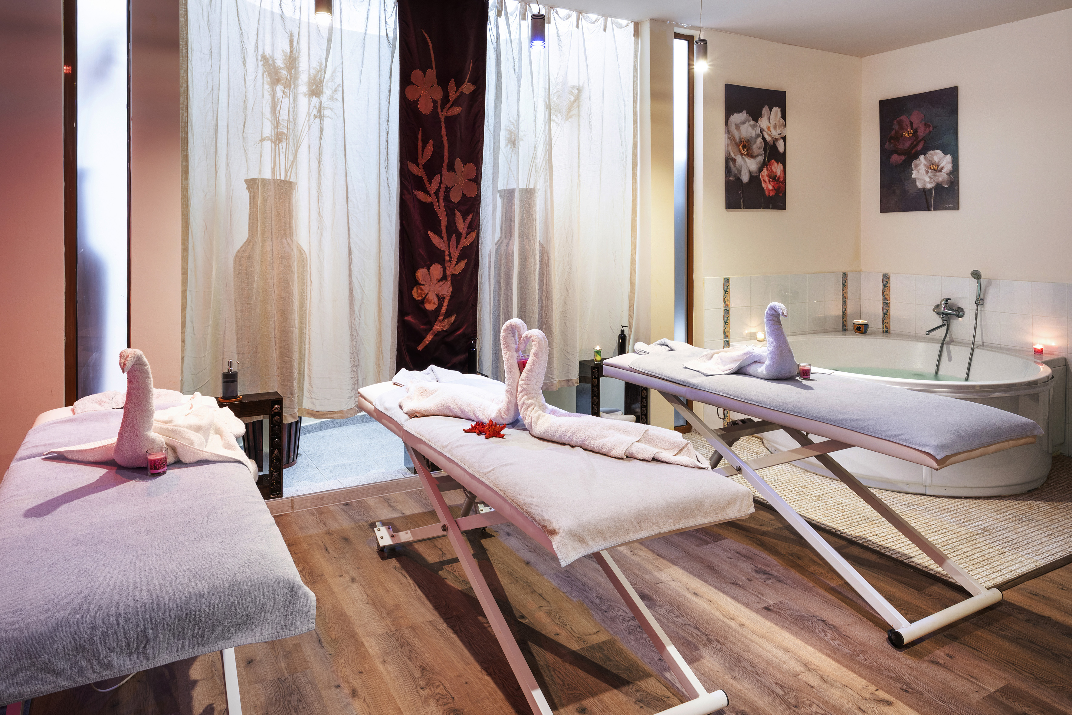 a massage table with towels and towels on it