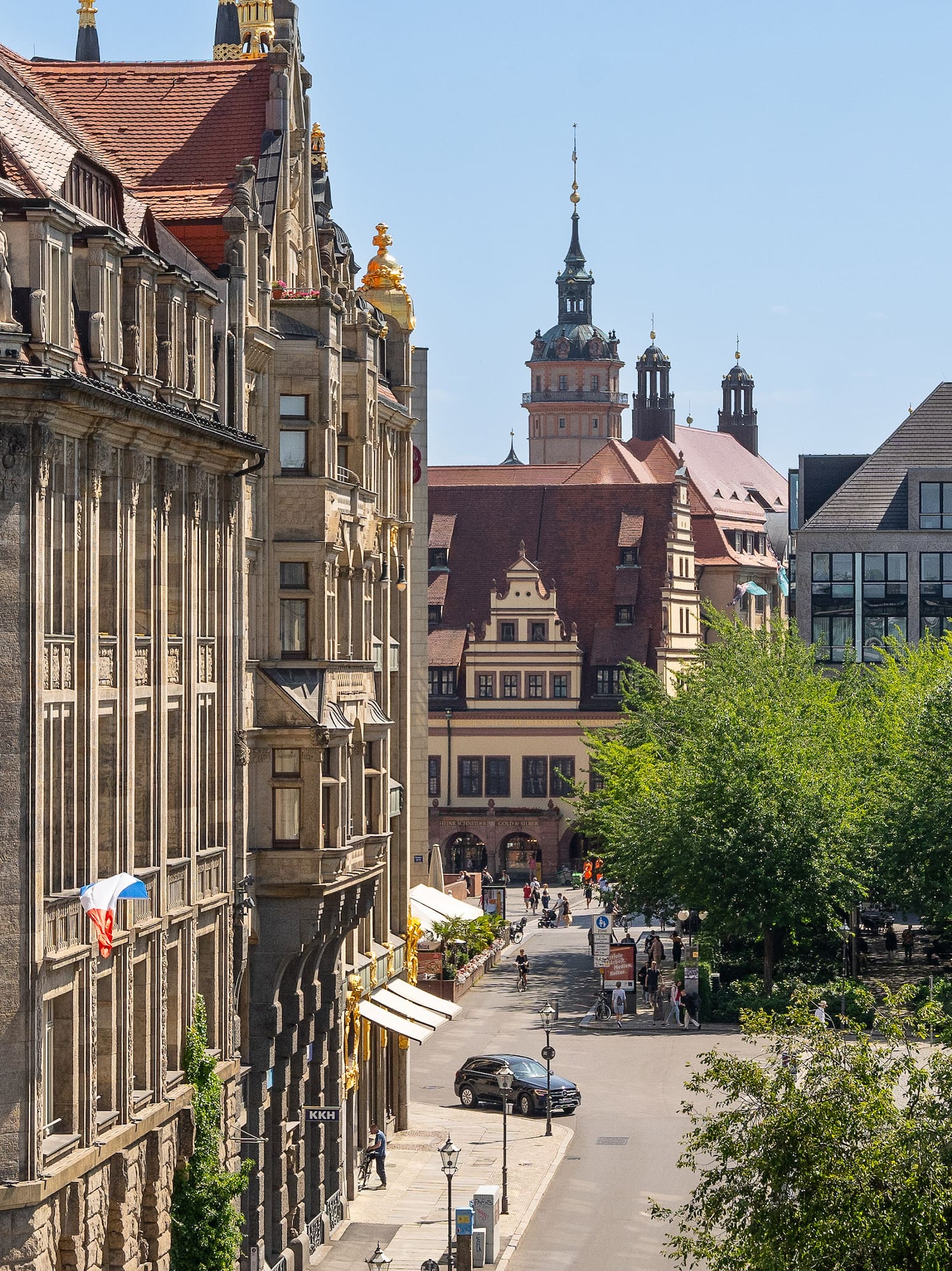 a street with buildings and trees