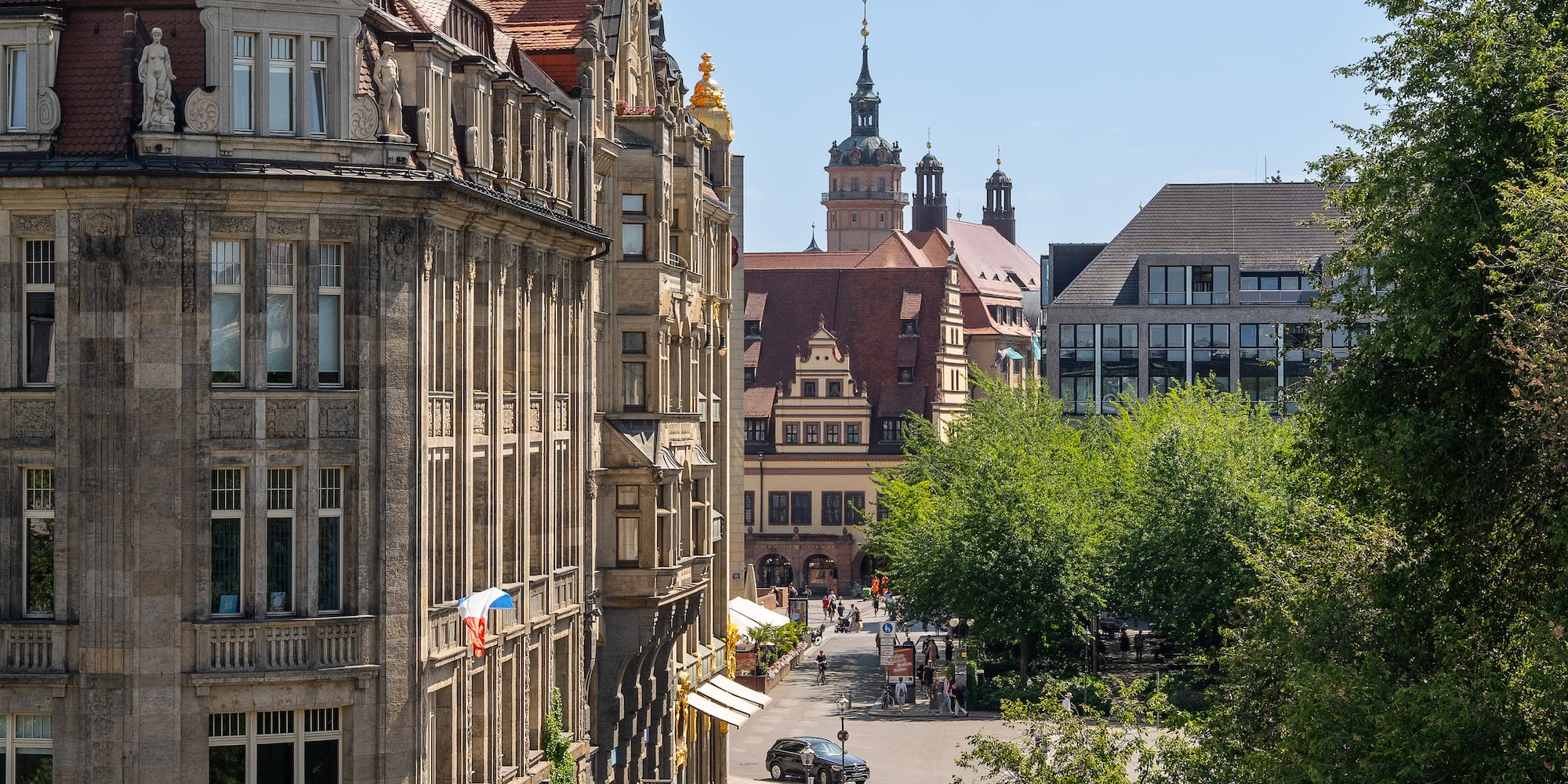 a street with buildings and trees