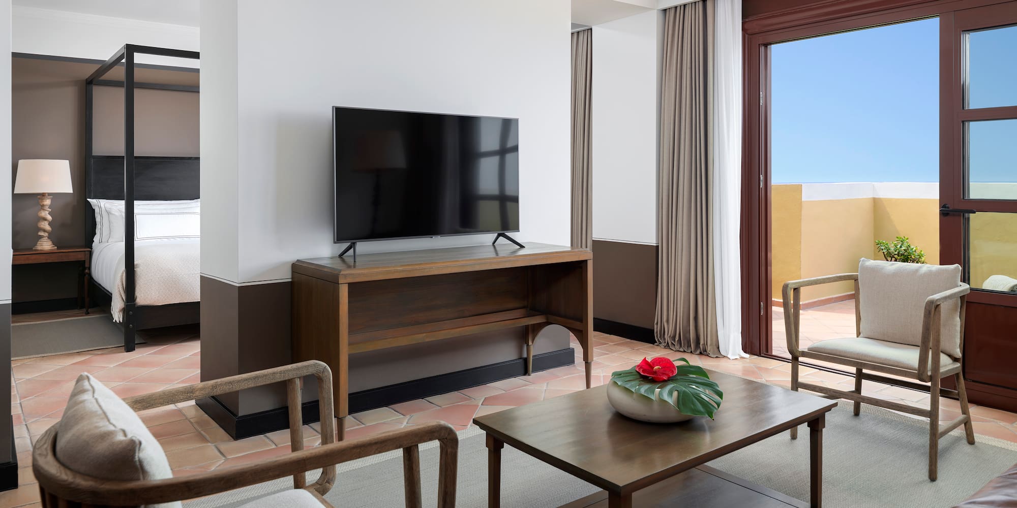 a room with a television and a couch