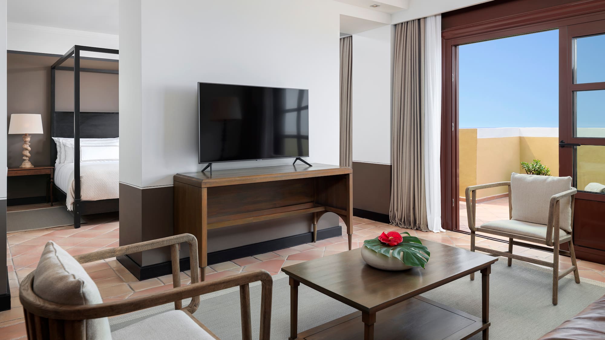 a room with a television and a couch