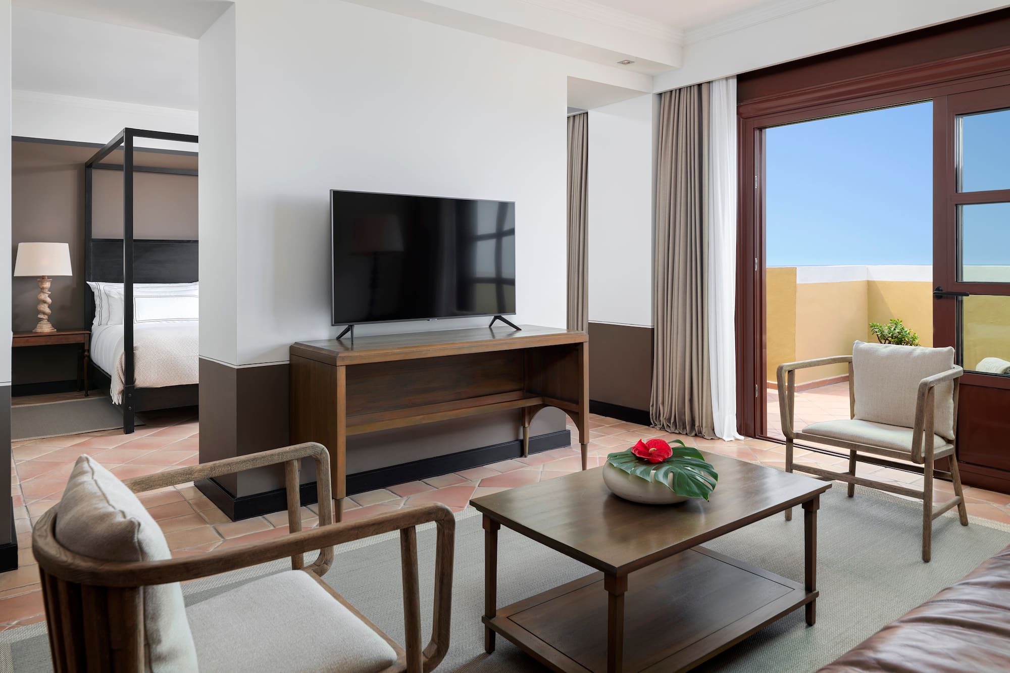 a room with a television and a couch