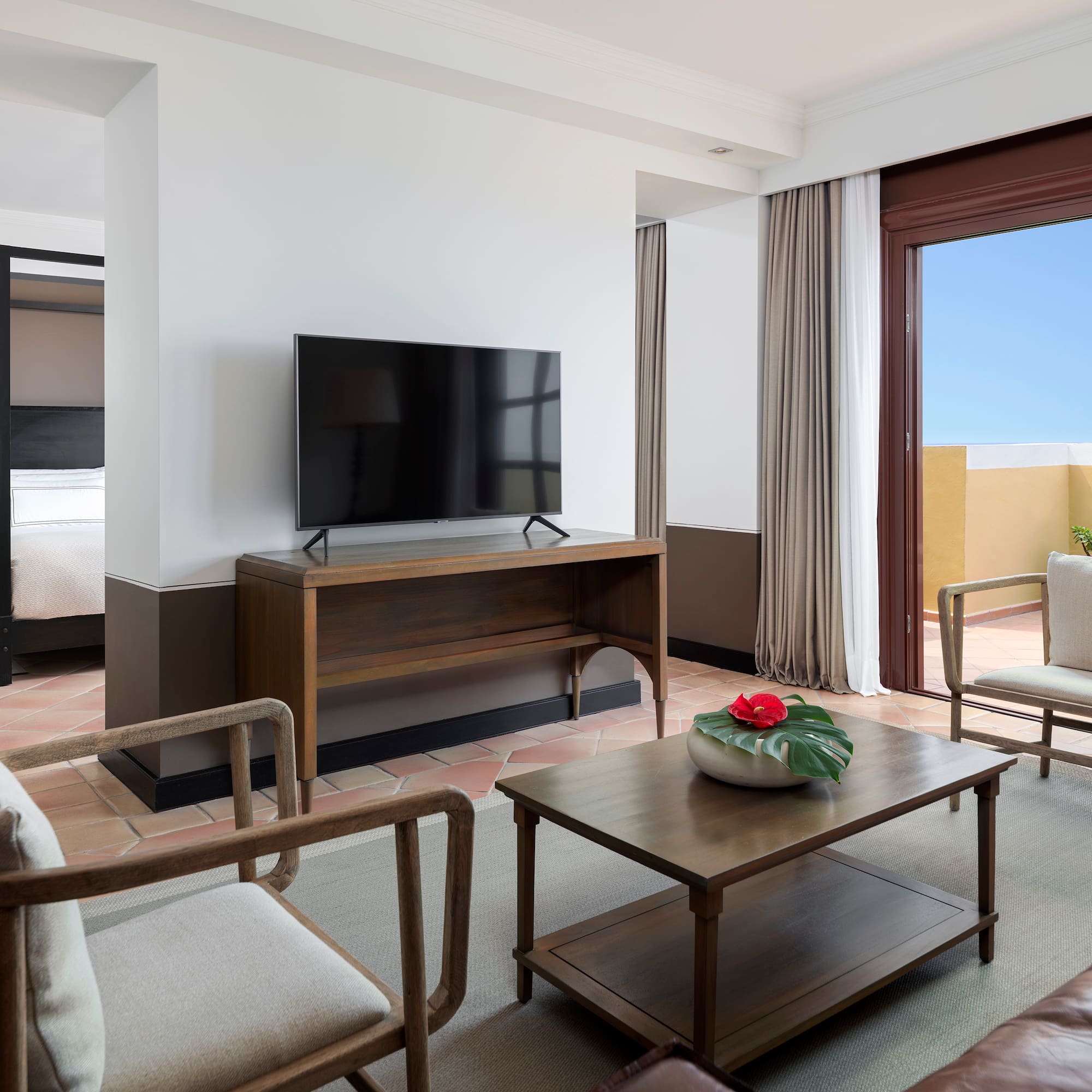 a room with a television and a couch