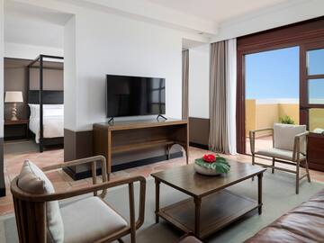 a room with a television and a couch