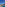 Marbella beach, Puente Romano red bridge, white hotel, and mountains under blue sky.
