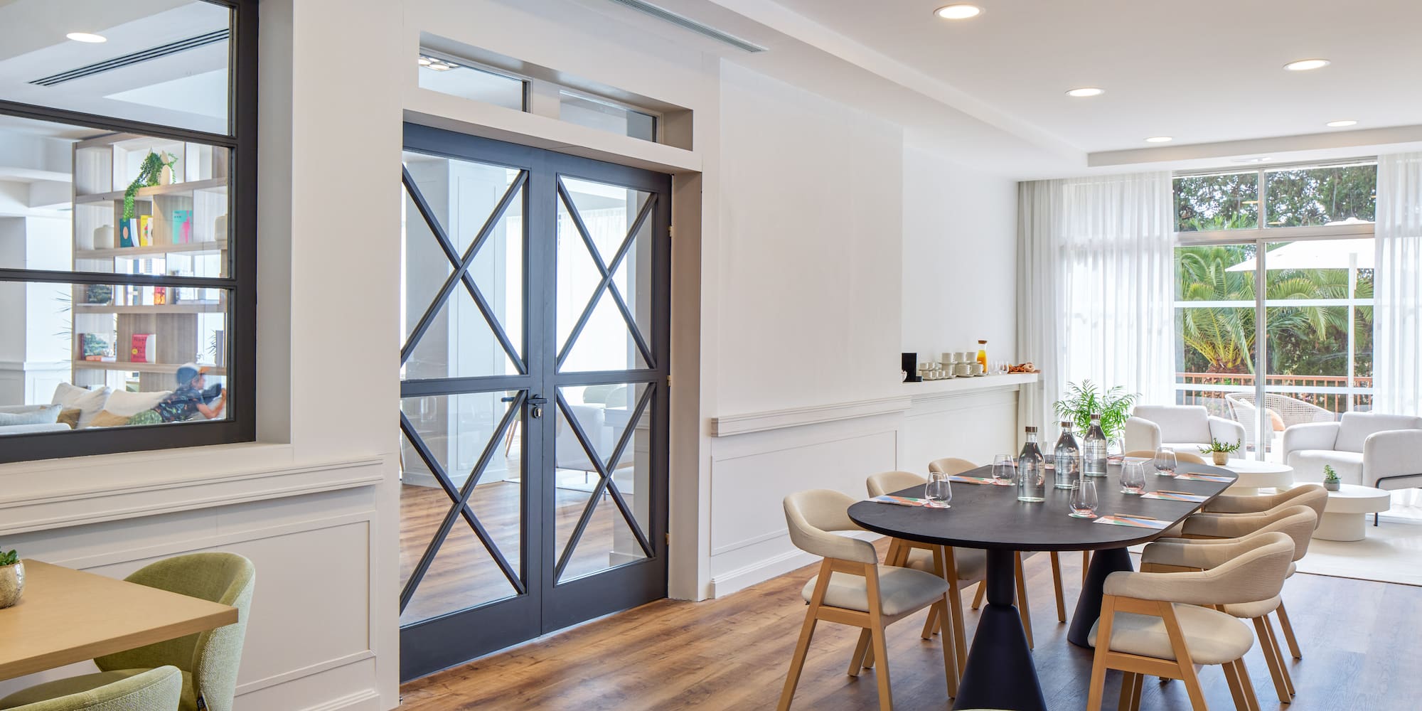 a room with a table and chairs