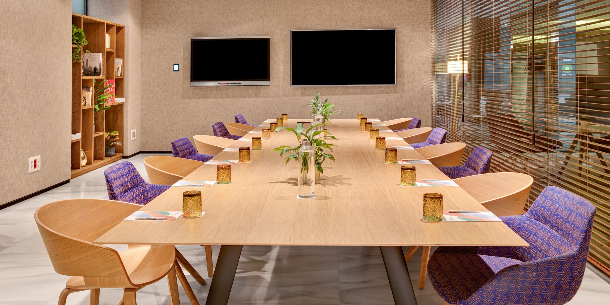 a room with a table and chairs