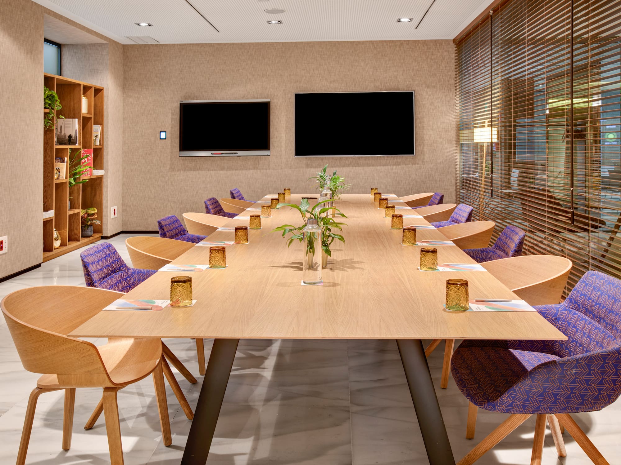 a room with a table and chairs