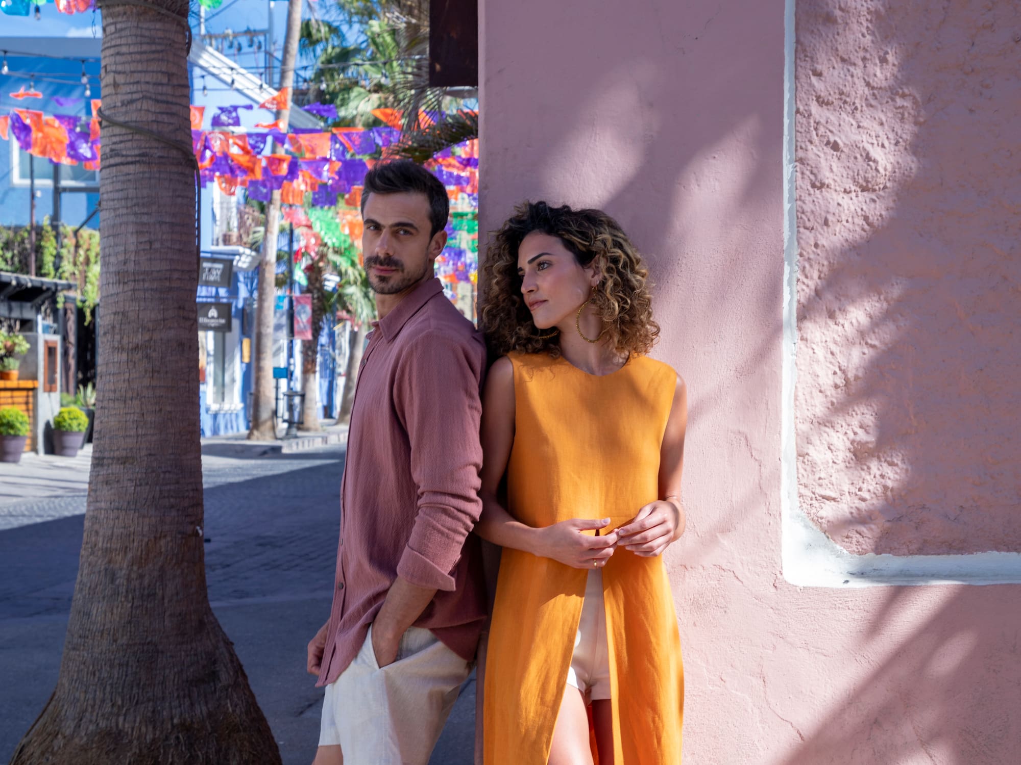 a man and woman standing next to each other