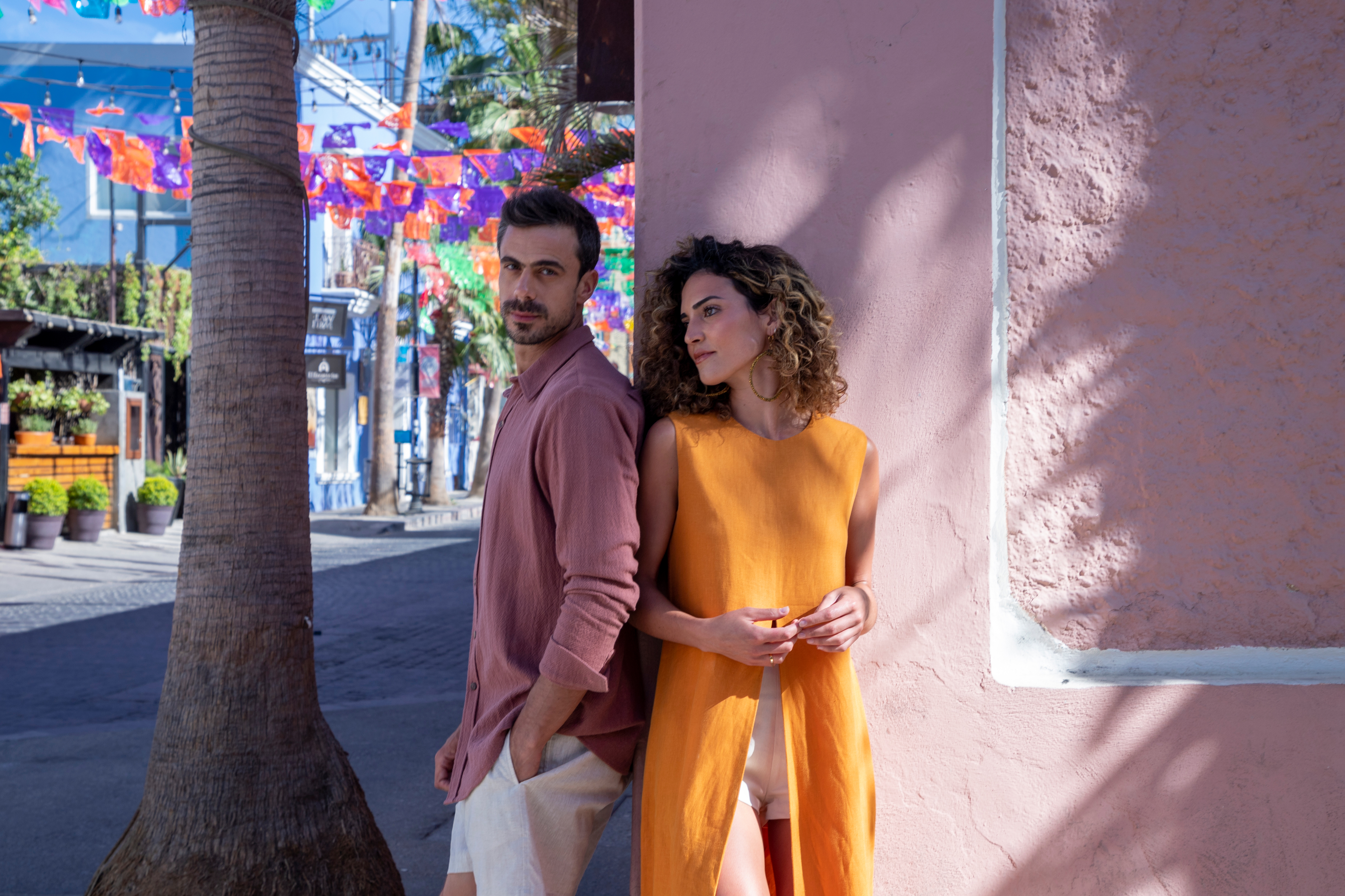 a man and woman standing next to each other