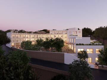 a building with trees around it