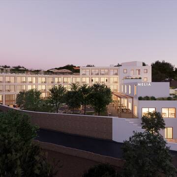 a building with trees around it