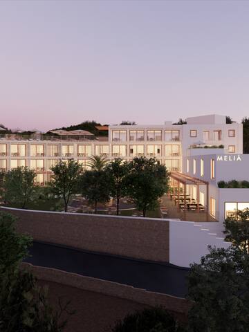 a building with trees around it