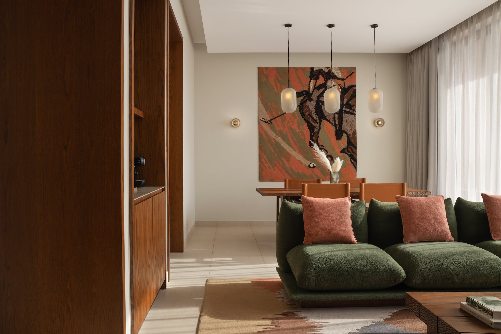 a living room with a couch and a table