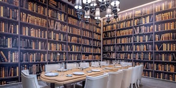 a room with a table and chairs