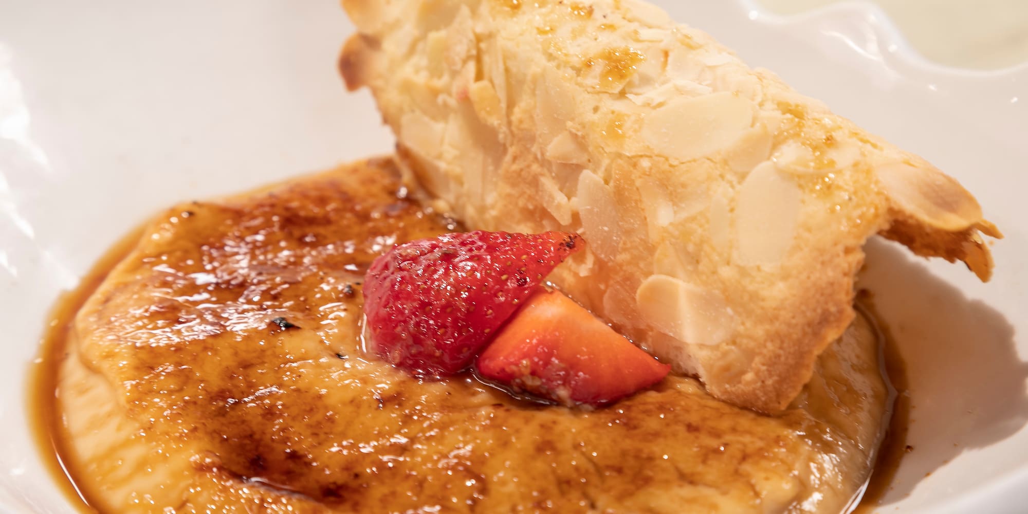 a dessert with a piece of pastry on top