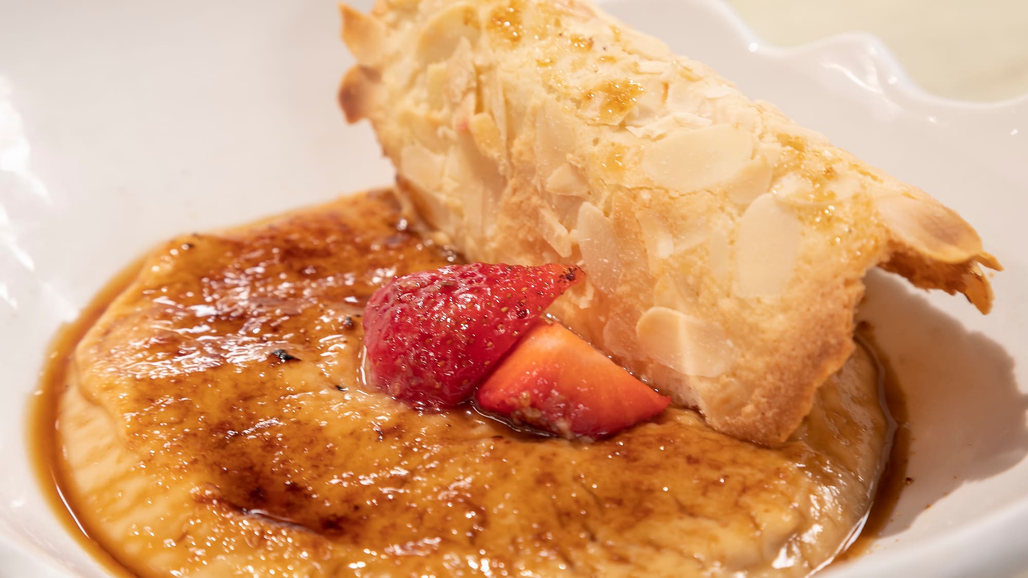 a dessert with a piece of pastry on top