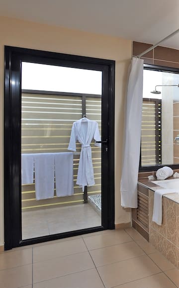 a door with a white robe on it