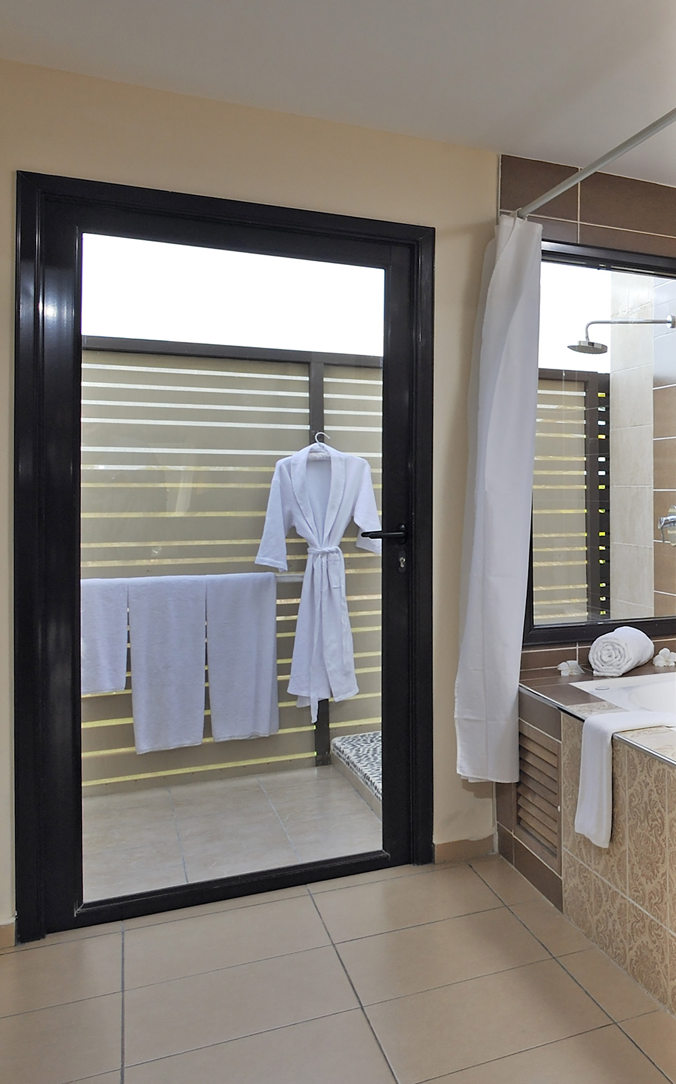 a door with a white robe on it