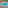 Resort swimming pool with sun loungers, shaded areas, and tropical trees.