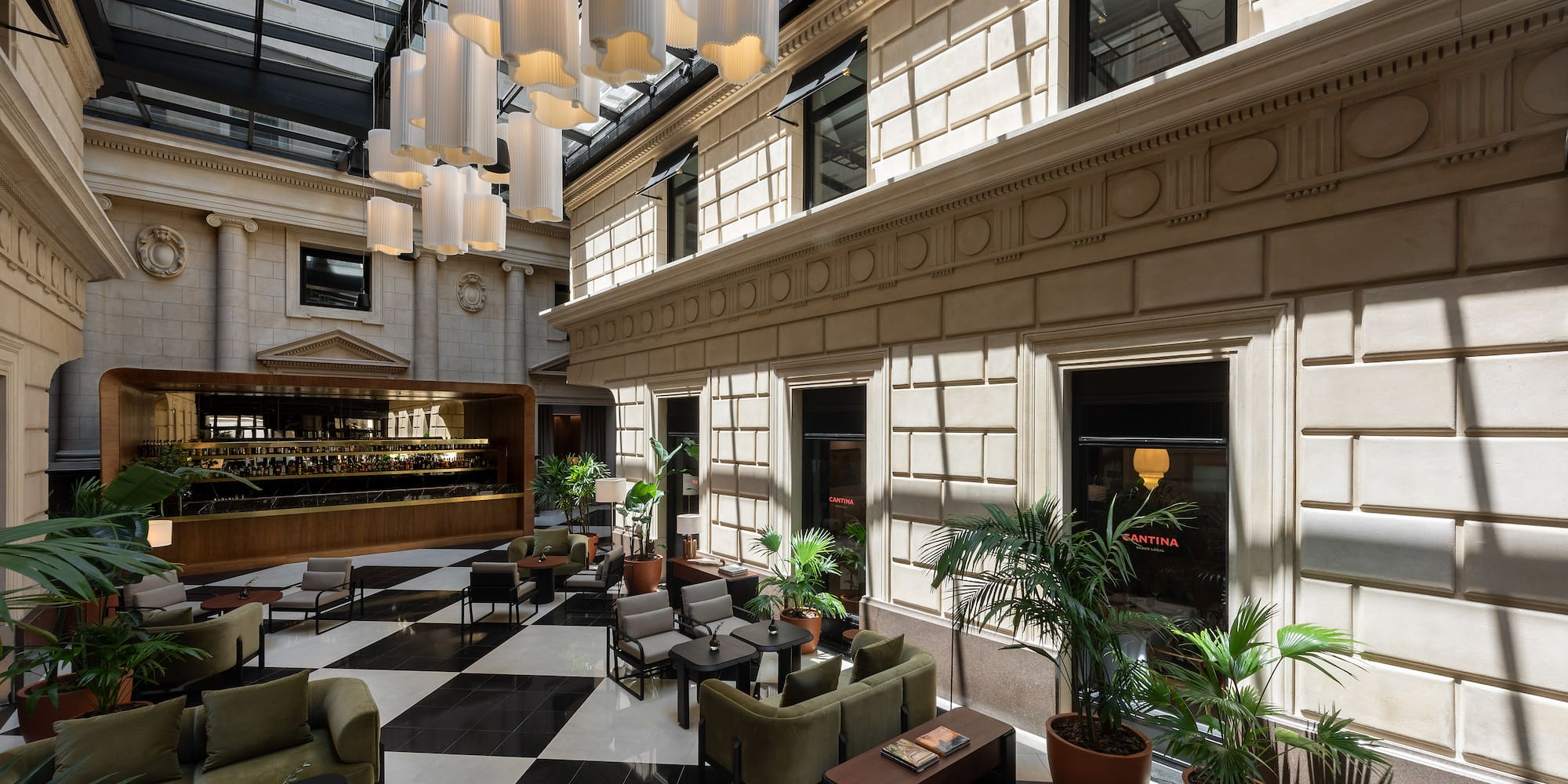 a room with a black and white checkered floor and a black and white tiled floor