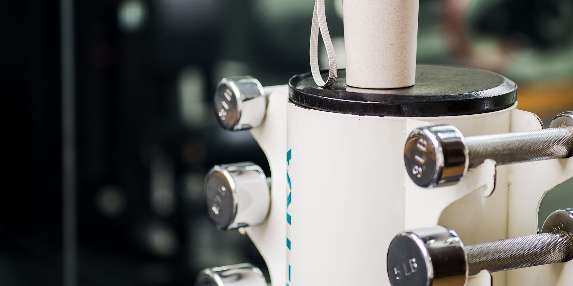 a white object with weights on it