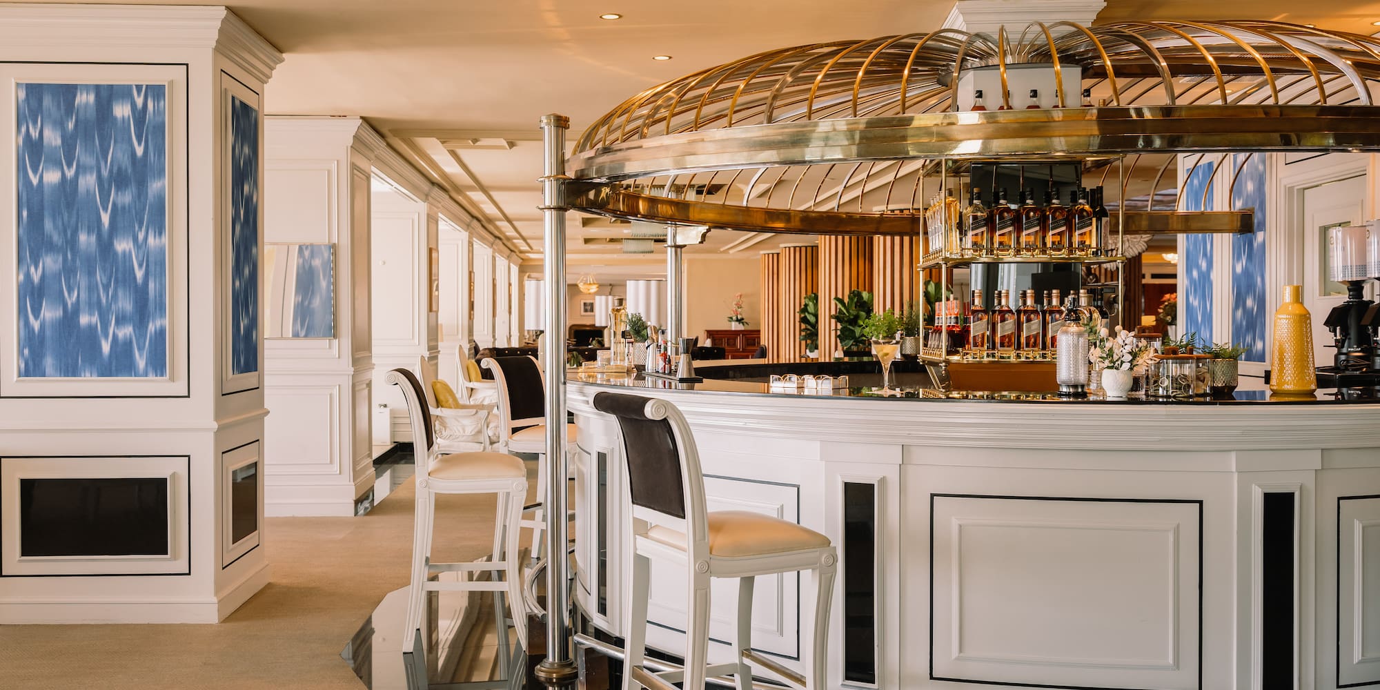 a bar with a bar and chairs