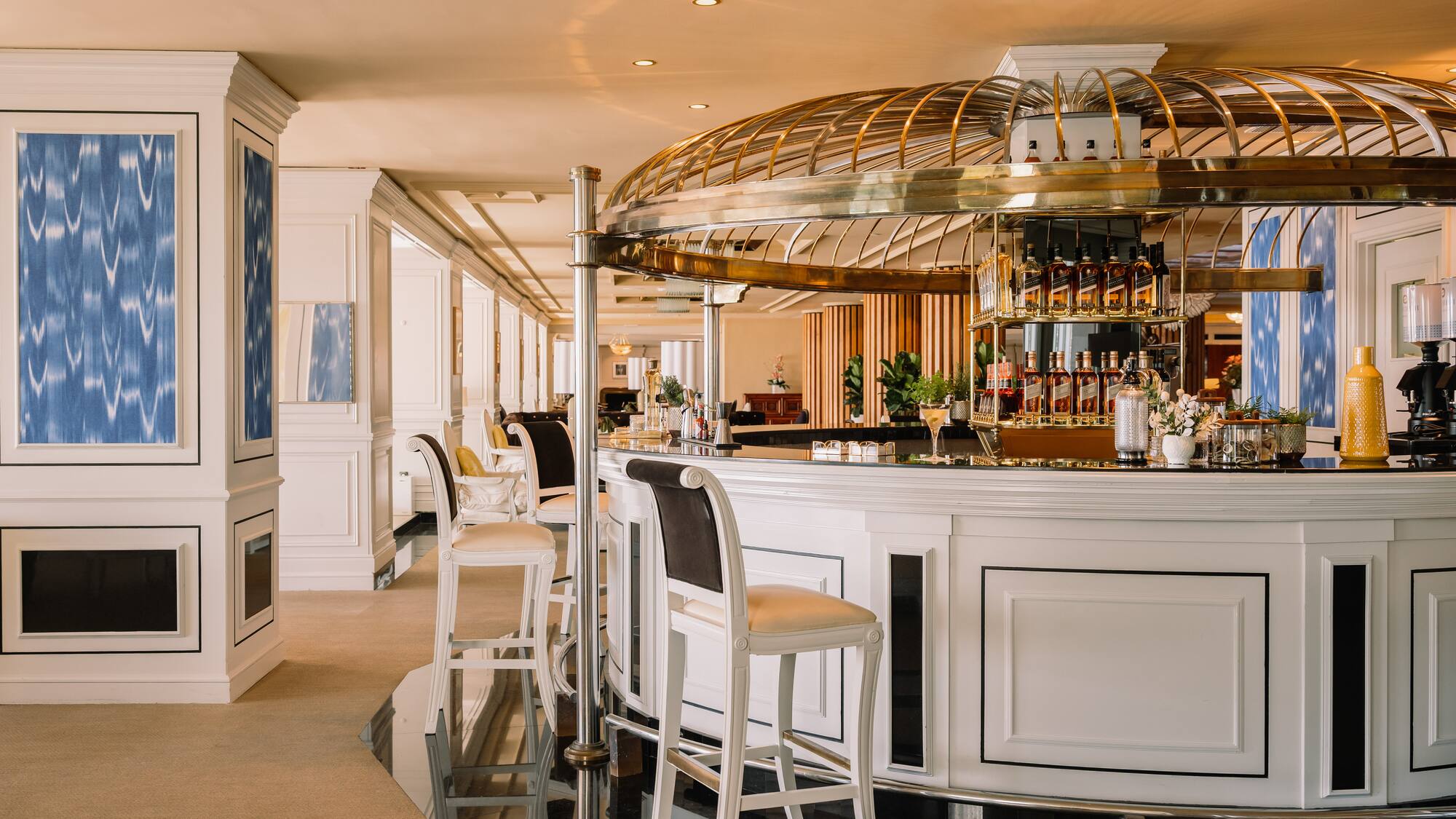 a bar with a bar and chairs