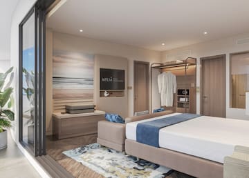 a bedroom with a bed and a wardrobe