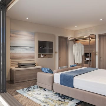 a bedroom with a bed and a wardrobe