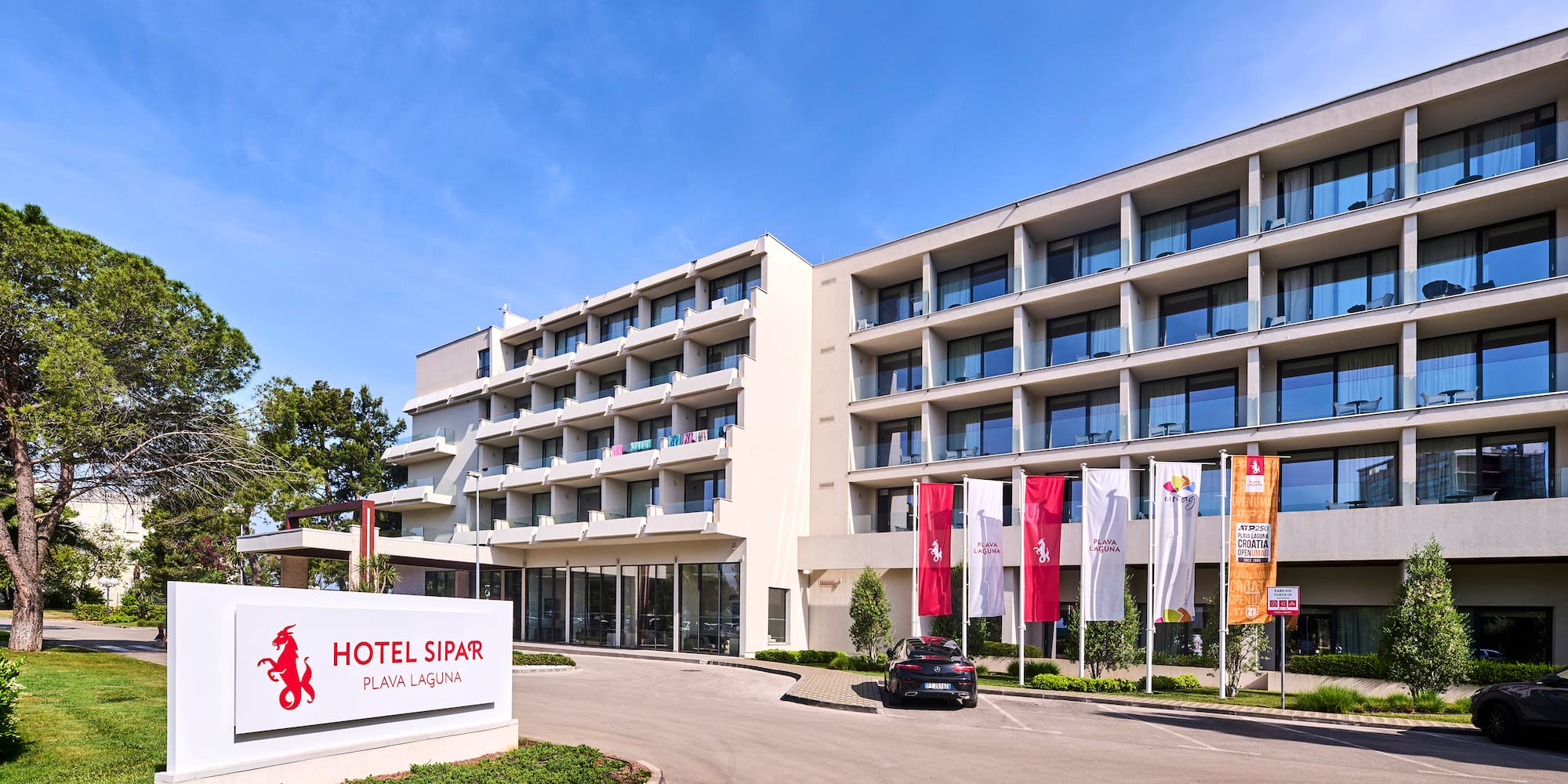 a building with flags in front of it