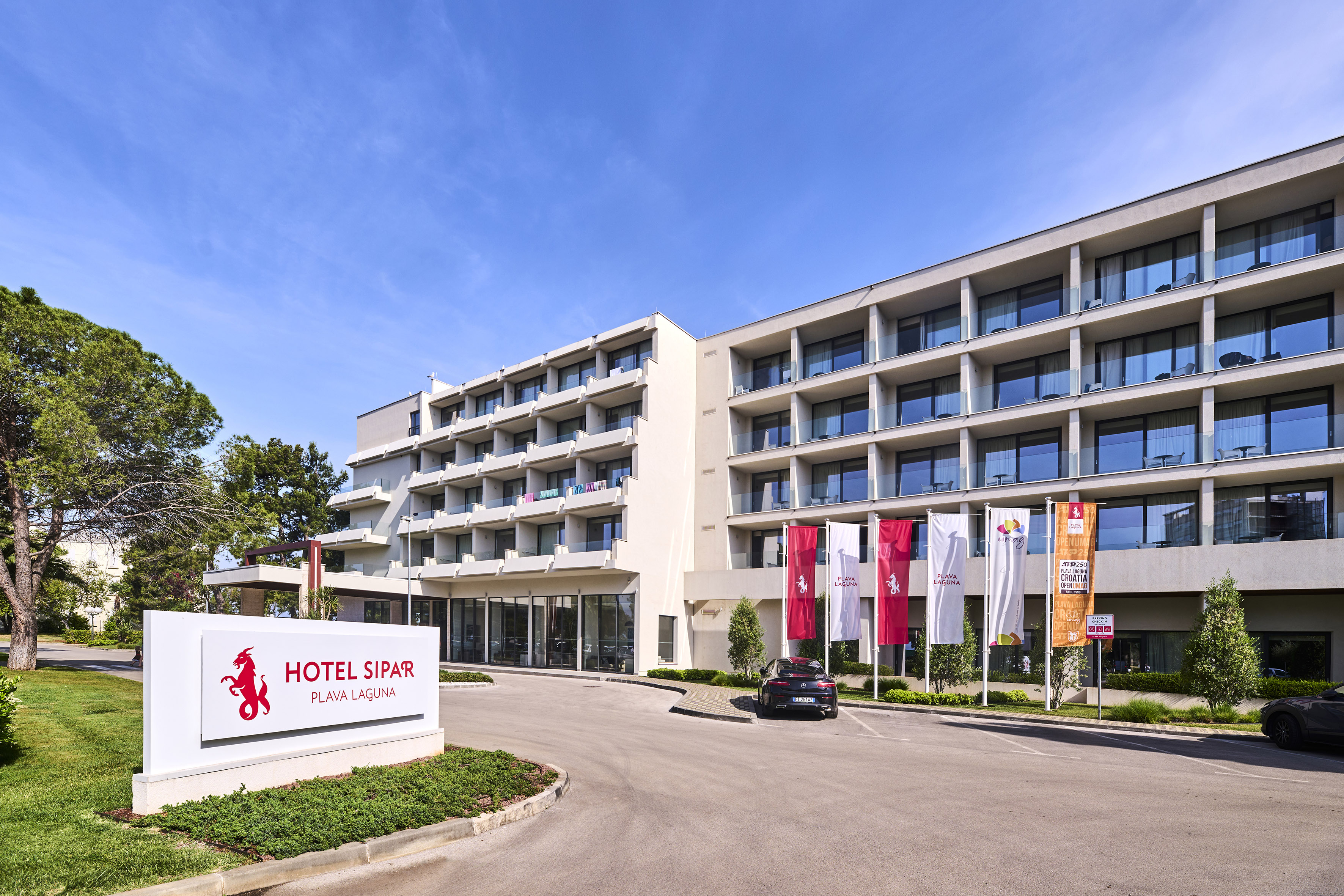 a building with flags in front of it