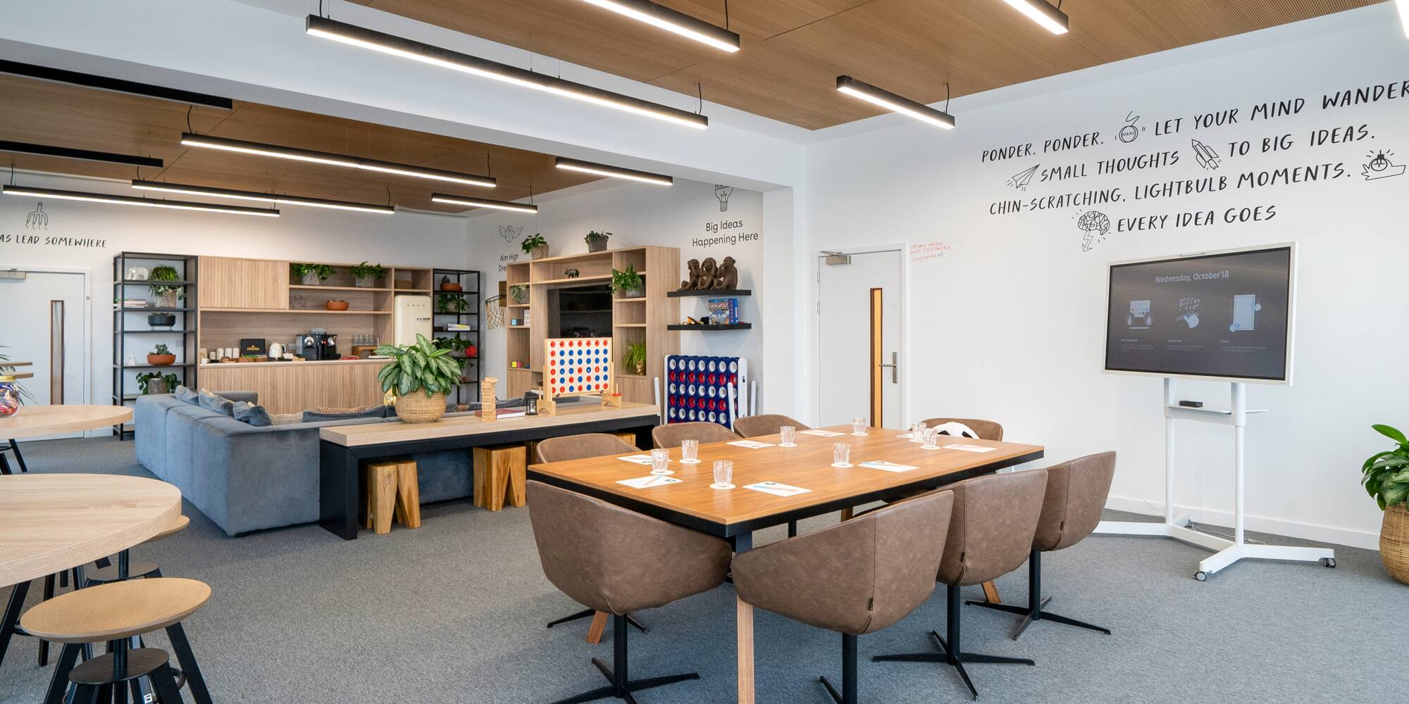 a room with a table and chairs