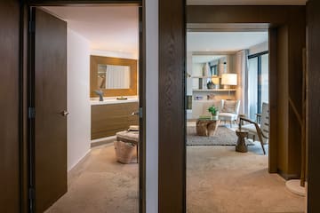 a room with a mirror and a table