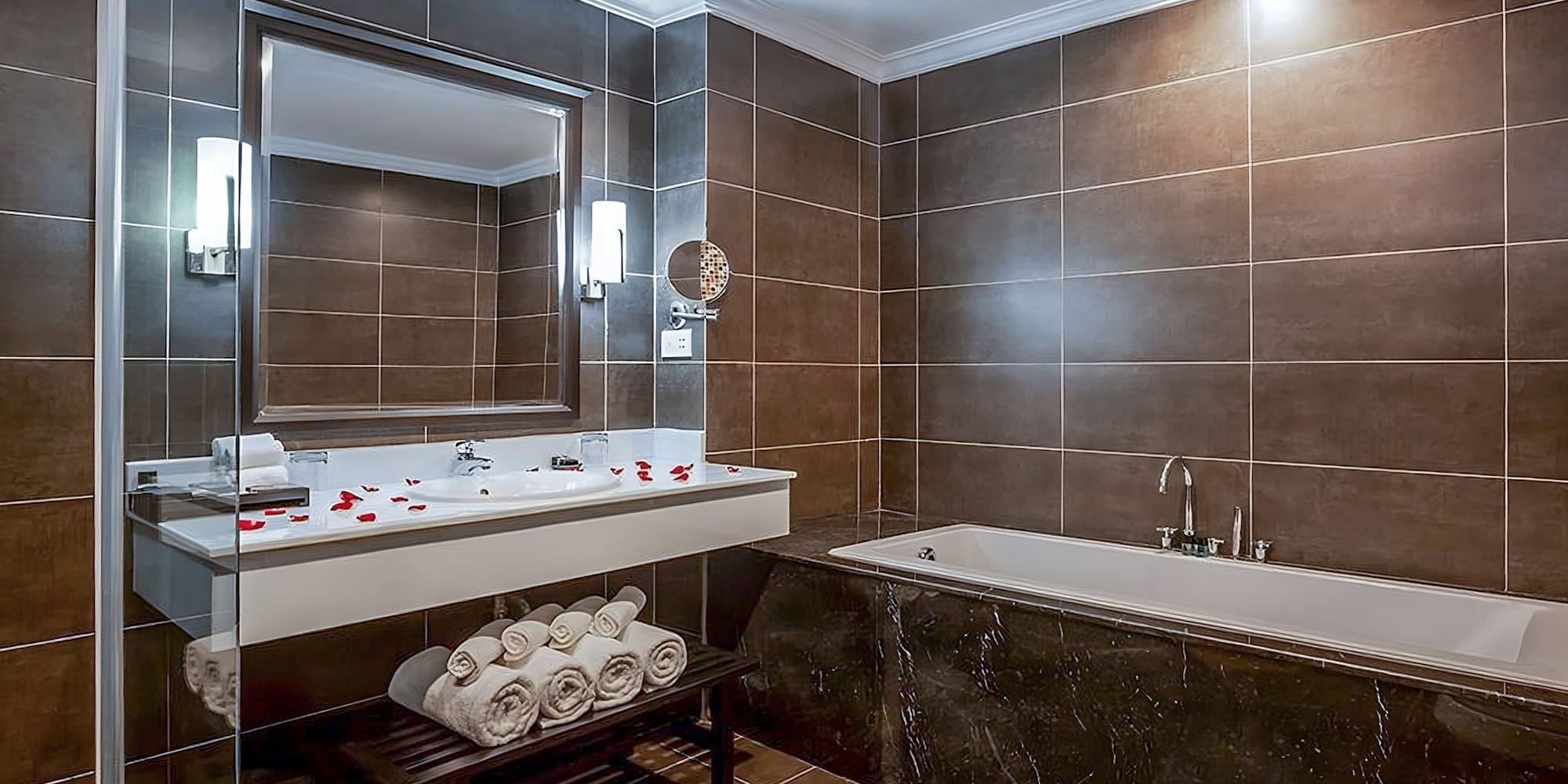 a bathroom with a bathtub and a mirror