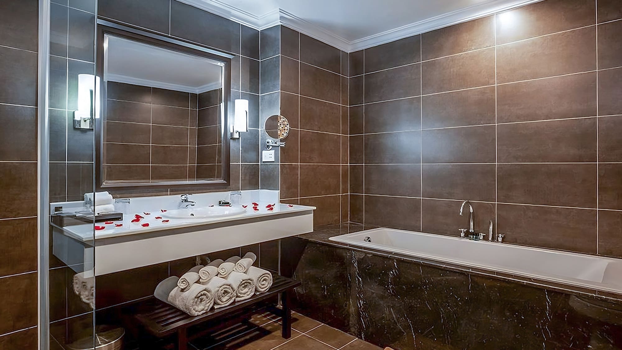 a bathroom with a bathtub and a mirror