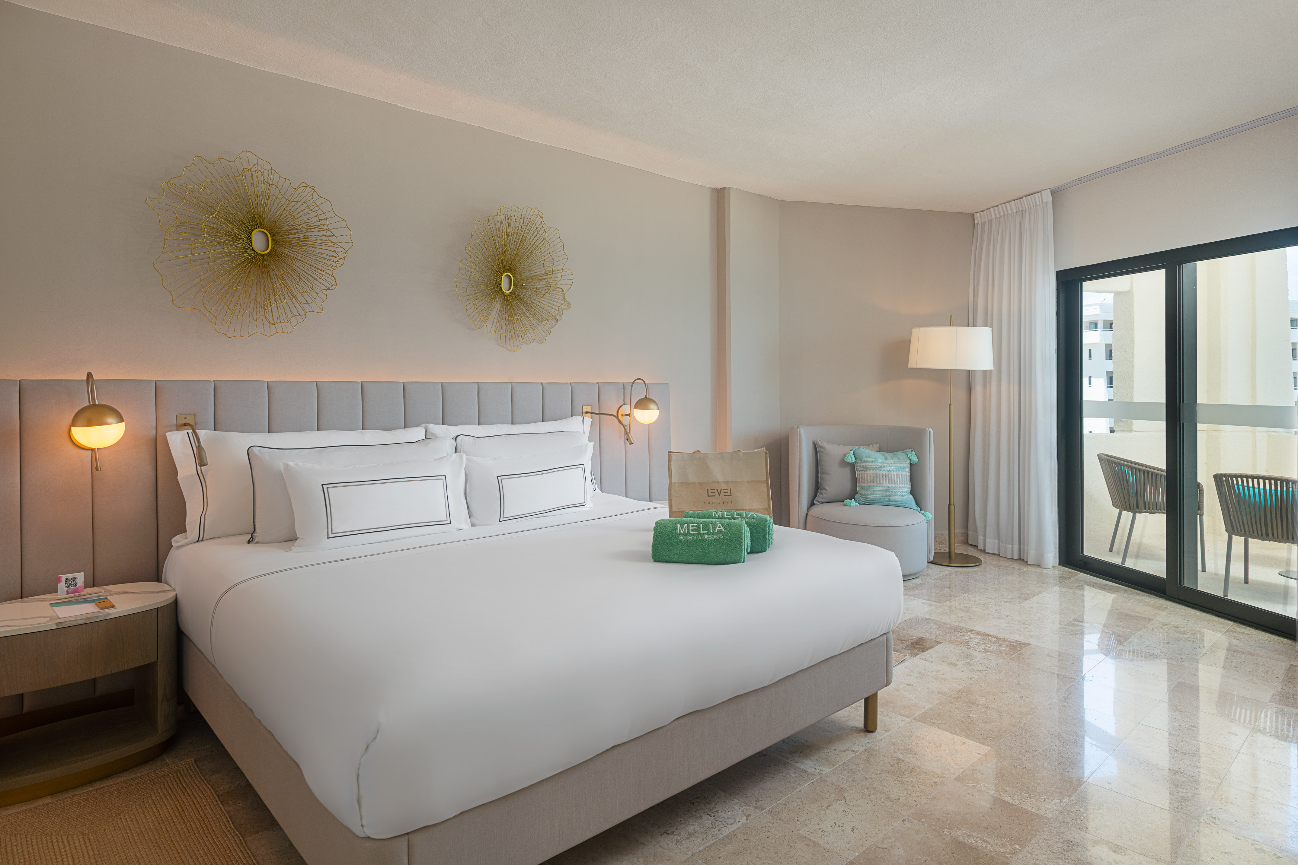 a room with a bed and a chair