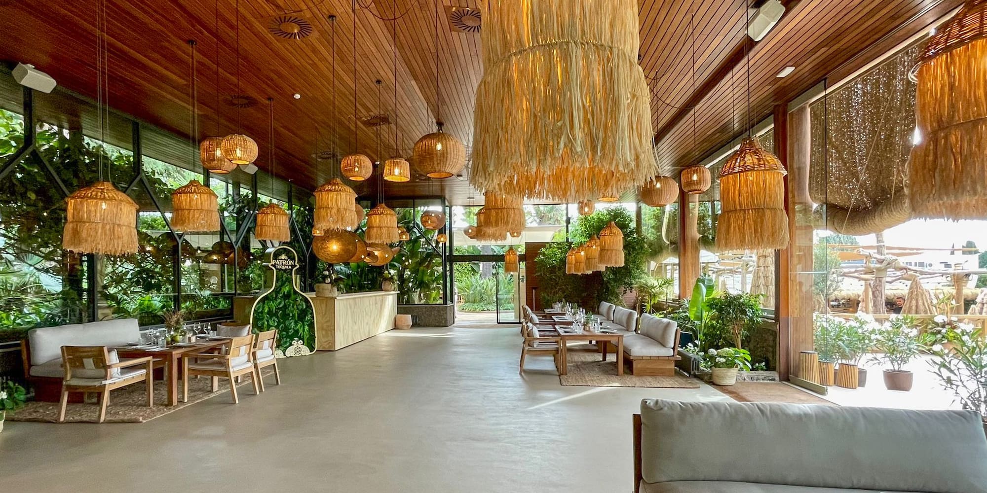 a room with a large ceiling and chandeliers