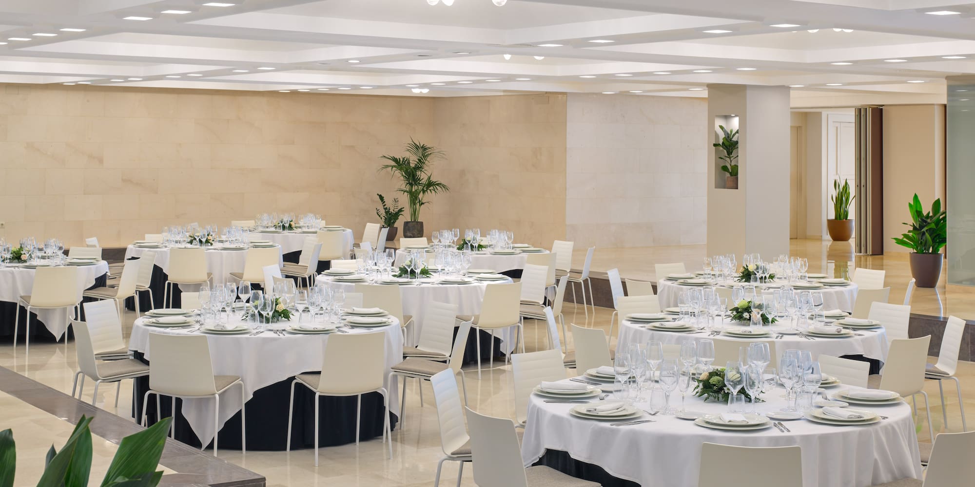 a large room with tables and chairs