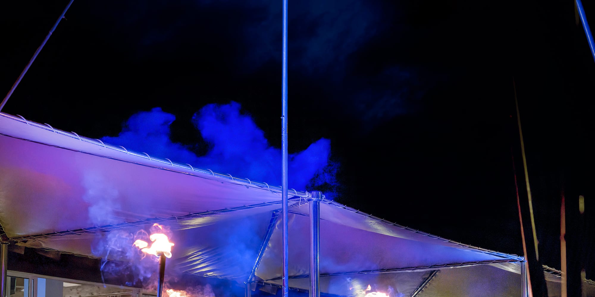 a group of people performing fire dancing