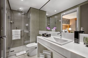 a bathroom with a sink and shower