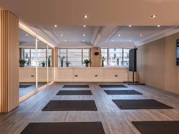 a room with mats on the floor